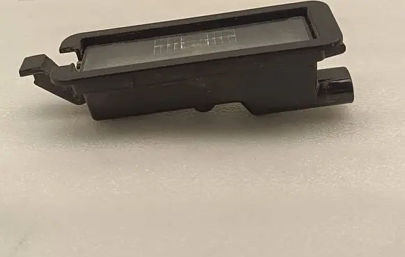 Chrysler Pacifica Number plate light 68276972AA 144583