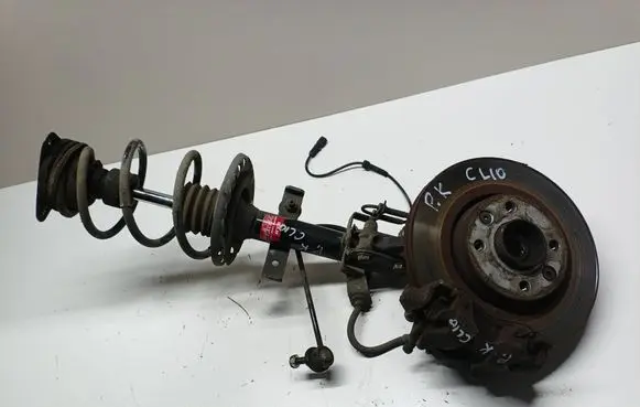 Renault Clio IV Front shock absorber with coil spring 3338037