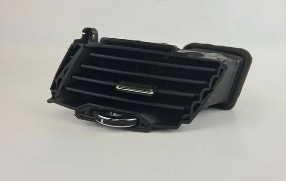 KIA Sportage Dash center air vent grill 974103W000
