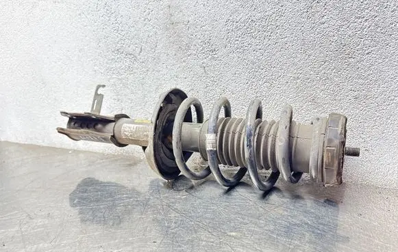 Opel Astra J Front shock absorber with coil spring 13310101