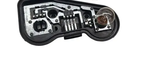 Saab 9-5 Tail light bulb cover holder 12778967 34332401