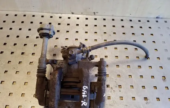Opel Astra J Rear brake caliper