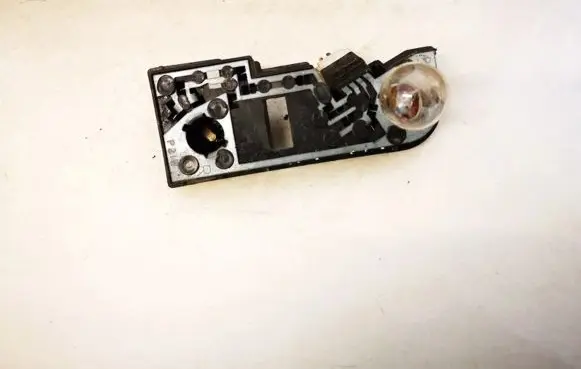 Nissan Primera Tail light bulb cover holder