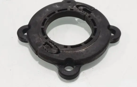 Opel Zafira B Lower shock absorber bracket 