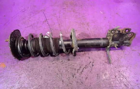 Mitsubishi Colt Front shock absorber with coil spring 