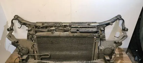 Radiator support slam panel