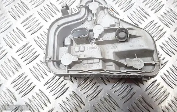 Tail light bulb cover holder