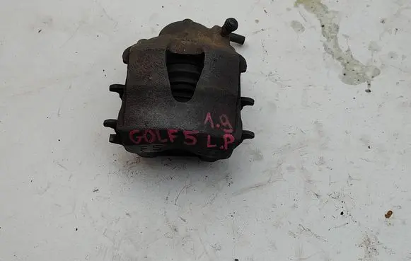 Volkswagen Golf V Front brake caliper 