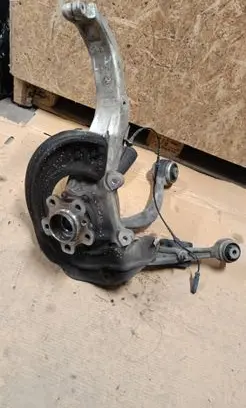 Front wheel hub spindle knuckle