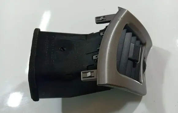 Dash center air vent grill