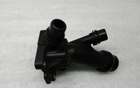 Thermostat/thermostat housing