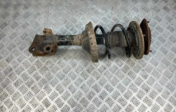 Subaru Legacy Front shock absorber with coil spring