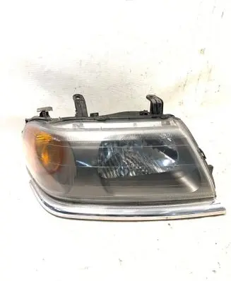 Mitsubishi Pajero Sport I Headlight/headlamp 10087415