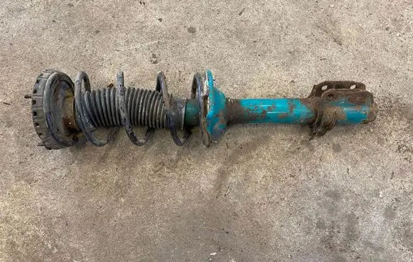 Subaru Forester SF Rear shock absorber with coil spring 