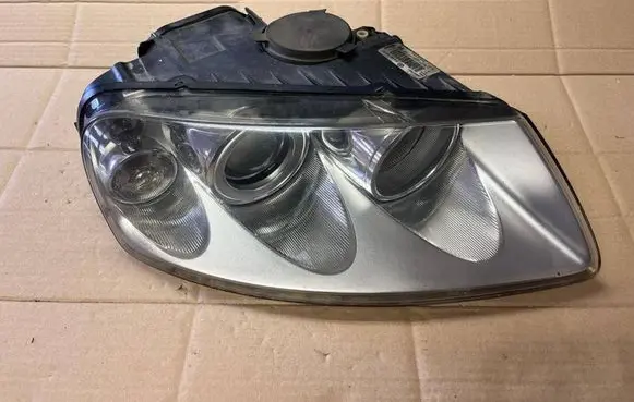 Volkswagen Touareg I Headlight/headlamp 7L6941016BJ 89307881