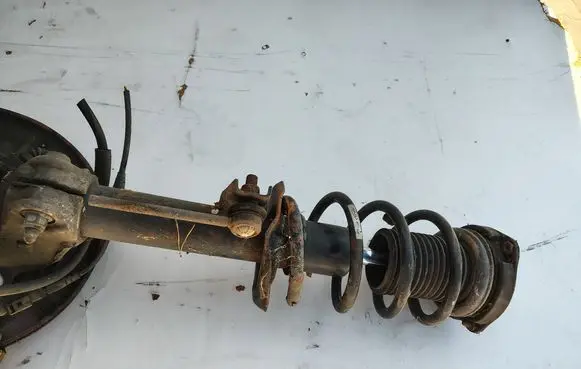 Volkswagen PASSAT CC Front shock absorber with coil spring 