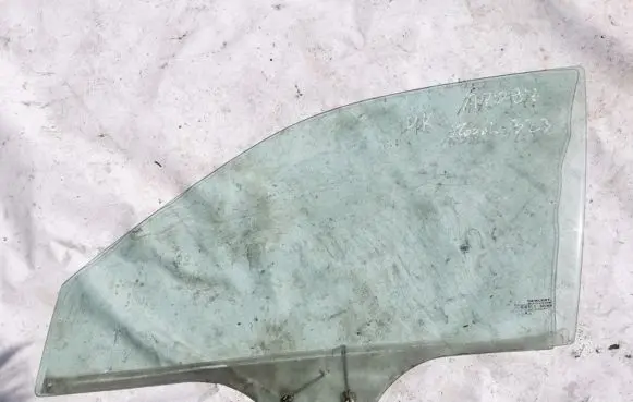 Mazda 323 Front door window glass four-door