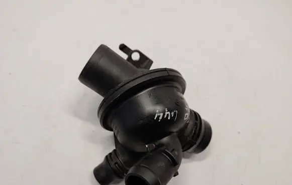 Thermostat/thermostat housing