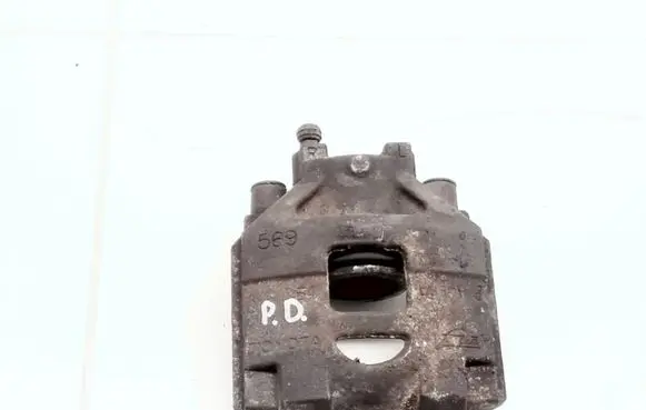 Toyota Yaris Front brake caliper 569