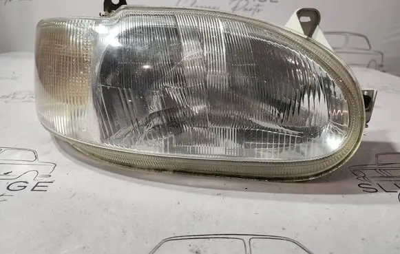 Ford Escort Headlight/headlamp 95AG13K060AA