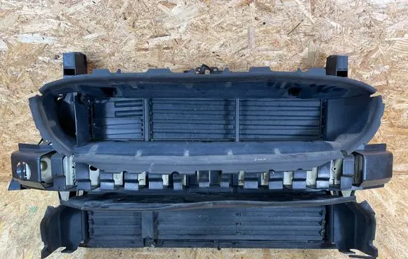 Radiator support slam panel