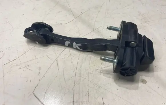 Front door check strap stopper