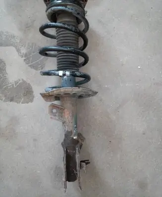 Nissan Qashqai+2 Front shock absorber/damper