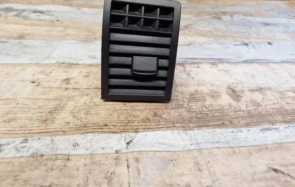 Dash center air vent grill