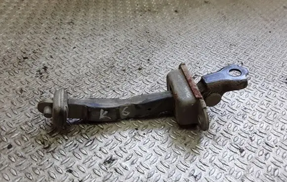 Rear door check strap stopper