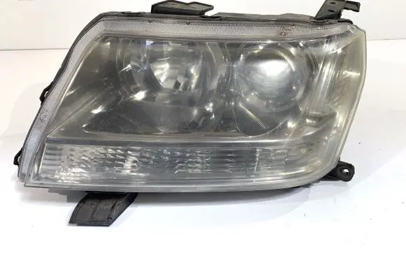 Suzuki Grand Vitara II Headlight/headlamp 10059079