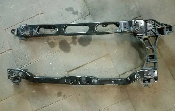 Radiator support slam panel bracket