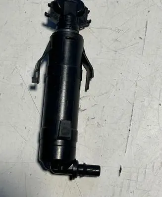 Headlight washer spray nozzle