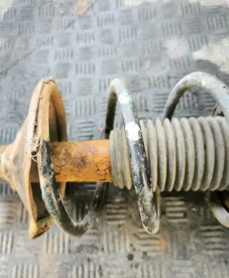 Subaru Legacy Front shock absorber with coil spring