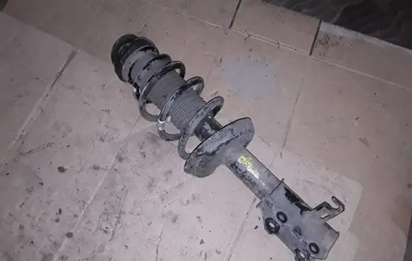 Opel Zafira C Front shock absorber with coil spring 13474022 522953660