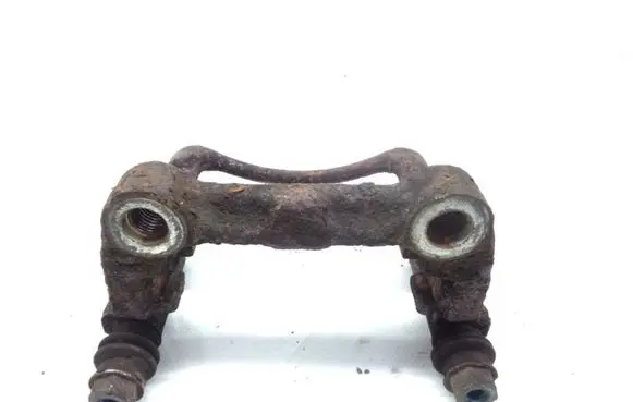 Volkswagen Touran I Brake caliper pad carrier rear 