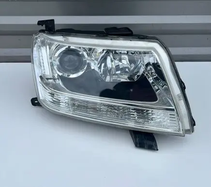 Suzuki Grand Vitara II Headlight/headlamp 10059079
