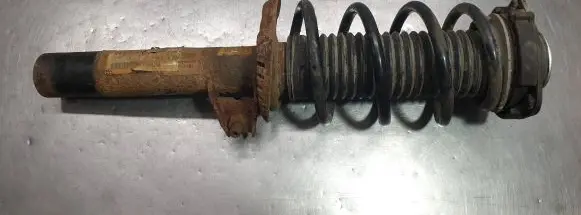 Volkswagen Touran II Front shock absorber with coil spring 1T0412015PR