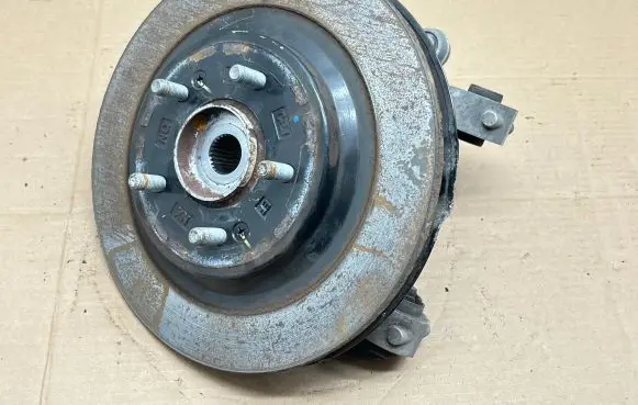 Rear wheel hub spindle/knuckle