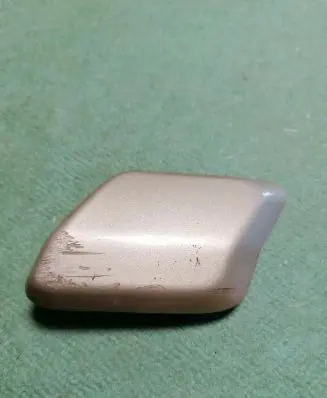 Headlight washer spray nozzle cap/cover