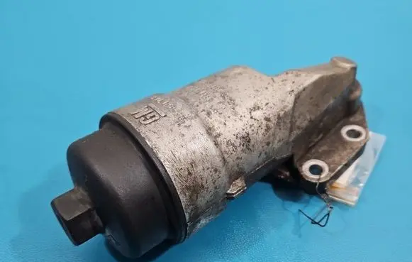 Opel Corsa E Oil filter mounting bracket 55560748 IMPRK1541398