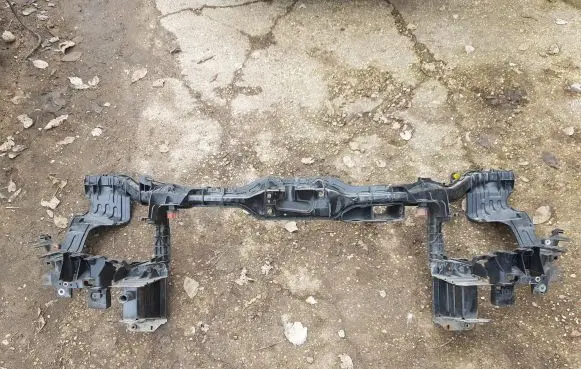 Radiator support slam panel