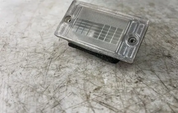 KIA Carens I Number plate light