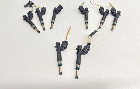 Nissan Juke I F15 Fuel injector 1130320 3032105554 130321055540010