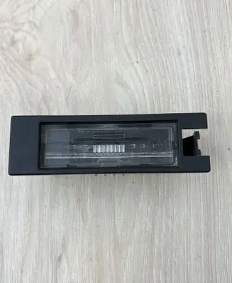Opel Corsa D Number plate light 13251936