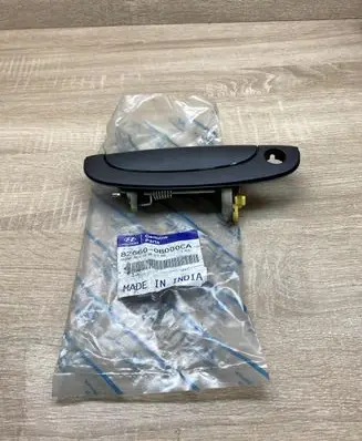Hyundai Accent Front door exterior handle 826600B000CA