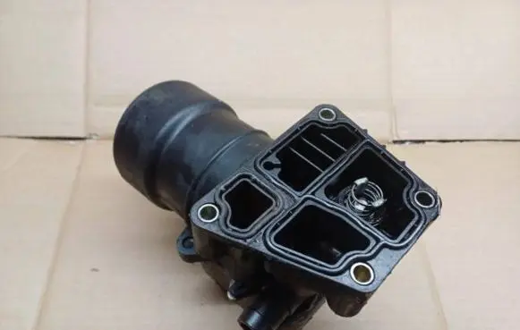 Skoda Yeti (5L) Oil filter mounting bracket 03L115389G 28112014280 0F1534