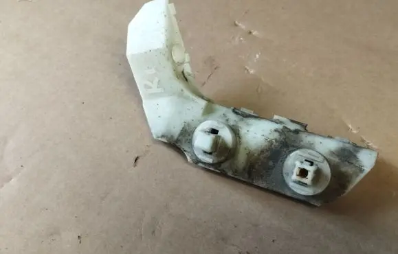 Infiniti G37 Front bumper mounting bracket