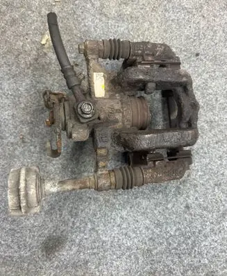 Opel Astra J Rear brake caliper 13407126