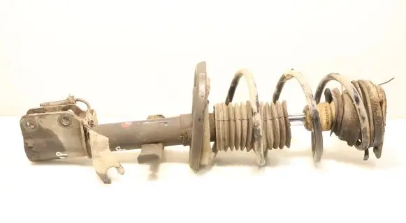 Renault Clio IV Front shock absorber with coil spring