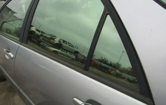 Cadillac SRX Rear door window glass 